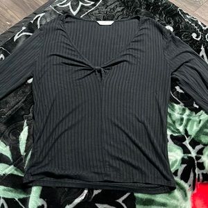 Black V shaped long sleeve top